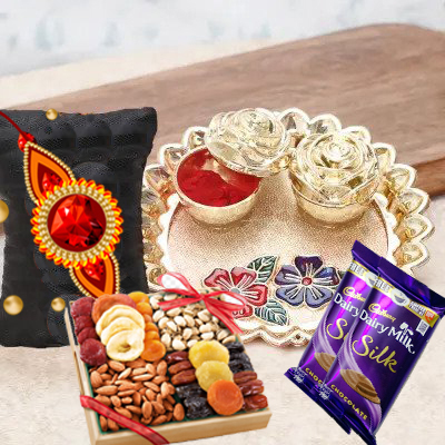 send fererro rocher, kaju katli, mixed flowers and dryfruits with rakhi to belgaum