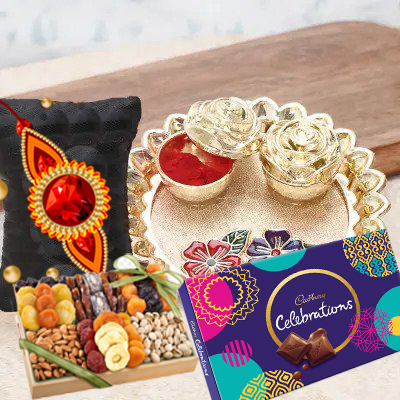 send fererro rocher, kaju katli, mixed flowers and dryfruits with rakhi to belgaum