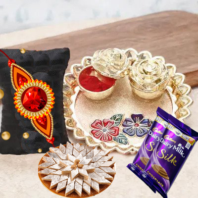 send fererro rocher, kaju katli, mixed flowers and dryfruits with rakhi to belgaum